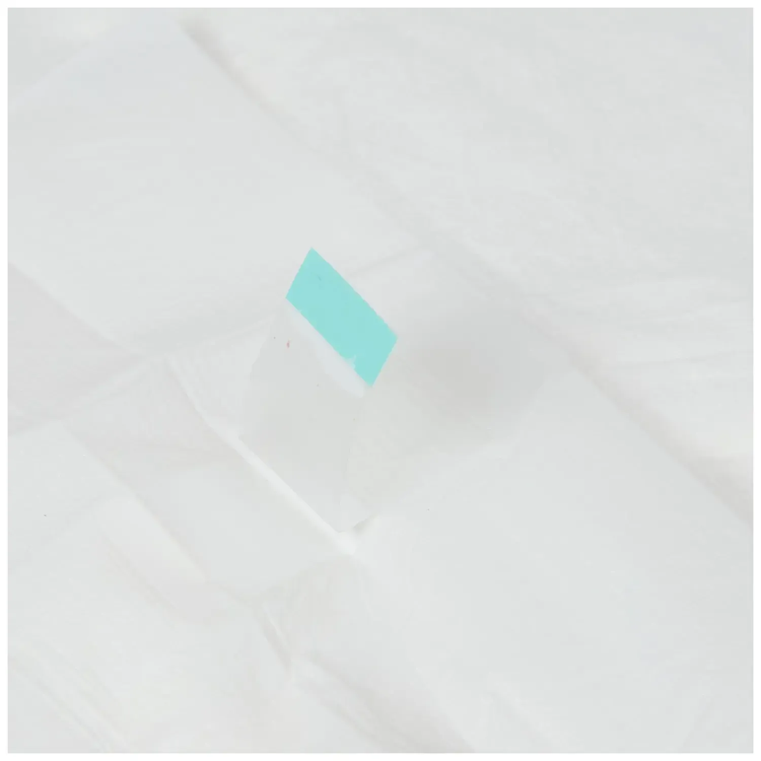 Tapete-Higienico-MyHug-Baby-60x55cm-para-Caes-Filhotes-30-unidades-foto-de-detalhe-da-lateral-do-produto